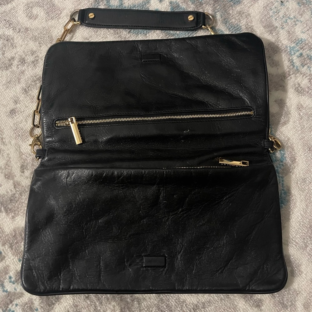 Tory Burch clutch on a chain